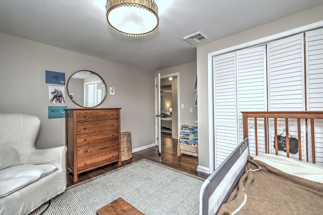 1690 Hartford Tpke, North Haven, CT 06473 - bedroom with wood finished floors, a closet, and baseboards