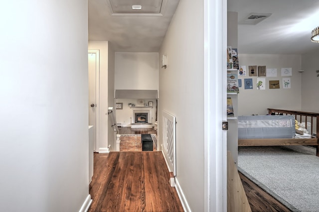 1690 Hartford Tpke, North Haven, CT 06473 - hall featuring dark wood-style floors and baseboards
