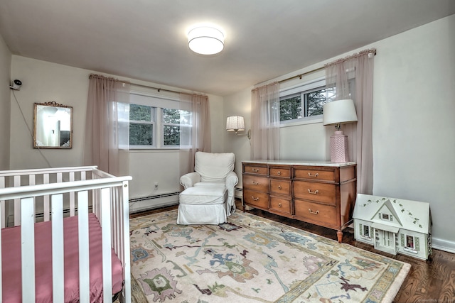 1690 Hartford Tpke, North Haven, CT 06473 - bedroom with baseboard heating and wood finished floors