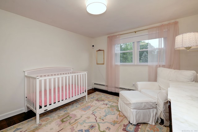 1690 Hartford Tpke, North Haven, CT 06473 - bedroom featuring wood finished floors, a baseboard radiator, and baseboards