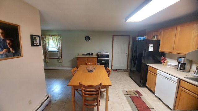 50 Highland Dr, Ledyard, CT 06339 - kitchen with dishwasher, stainless steel microwave, a baseboard heating unit, light countertops, and light tile patterned floors