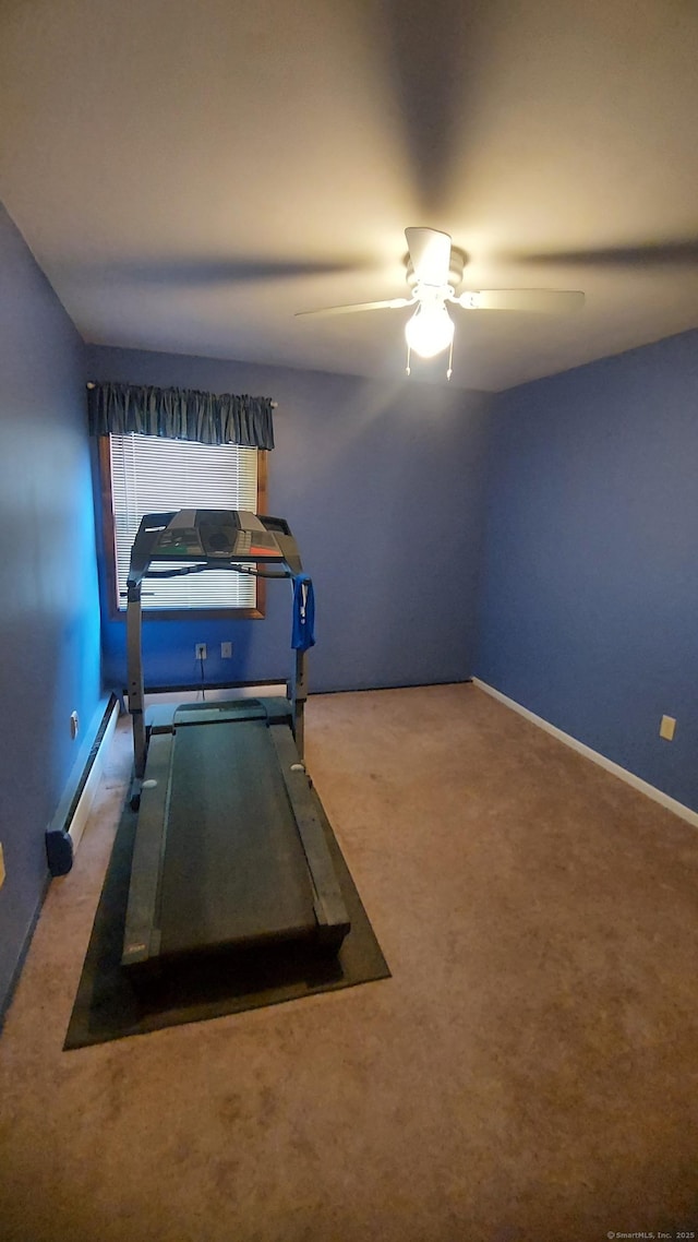 50 Highland Dr, Ledyard, CT 06339 - playroom with carpet, a ceiling fan, baseboard heating, and baseboards