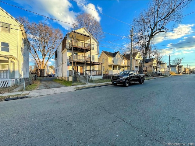 158 Martin St, Hartford, CT 06120 - view of asphalt road featuring sidewalks, curbs, and a residential view