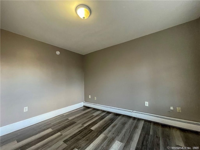 158 Martin St, Hartford, CT 06120 - spare room with dark wood-style floors, baseboards, and baseboard heating
