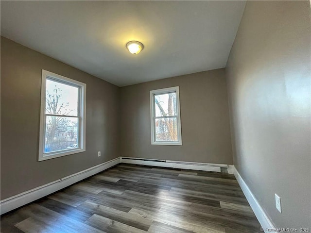 158 Martin St, Hartford, CT 06120 - unfurnished room featuring wood finished floors, a baseboard radiator, and baseboards