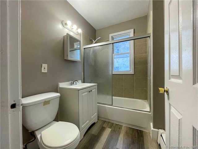 158 Martin St, Hartford, CT 06120 - bathroom featuring vanity, toilet, wood finished floors, combined bath / shower with glass door, and a baseboard radiator