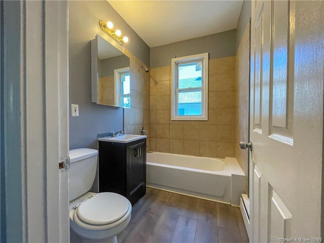 158 Martin St, Hartford, CT 06120 - full bath with wood finished floors, toilet, vanity, and bathtub / shower combination