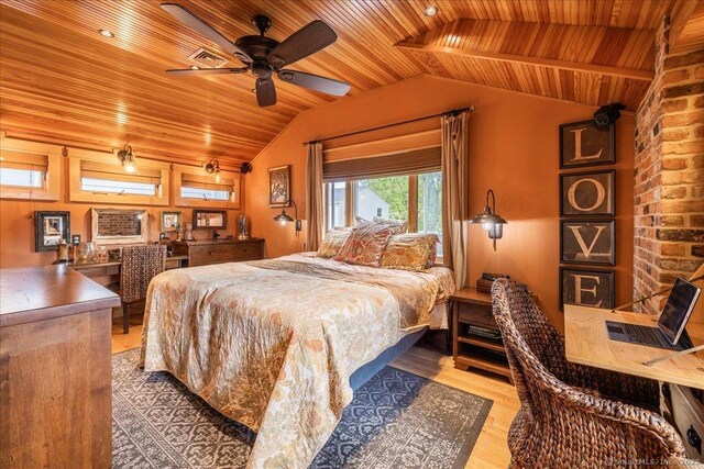 311 Captain Thomas Blvd, West Haven, CT 06516 - bedroom with lofted ceiling, wood ceiling, and wood finished floors