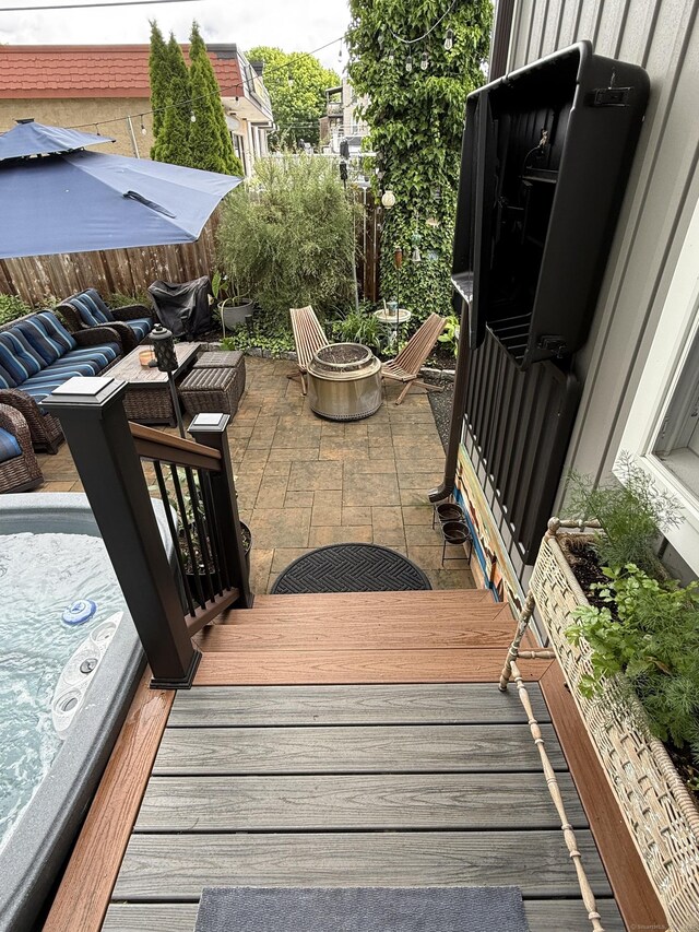 311 Captain Thomas Blvd, West Haven, CT 06516 - fenced backyard with a patio area and an outdoor fire pit