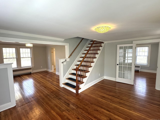 1188 Worthington Rdg, Berlin, CT 06037 - stairs featuring radiator heating unit, ornamental molding, hardwood / wood-style flooring, and baseboards