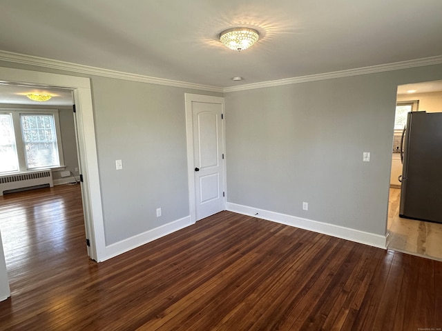 1188 Worthington Rdg, Berlin, CT 06037 - spare room with radiator, wood-type flooring, baseboards, and crown molding