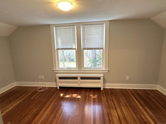 1188 Worthington Rdg, Berlin, CT 06037 - additional living space featuring lofted ceiling, dark wood-style floors, and baseboards