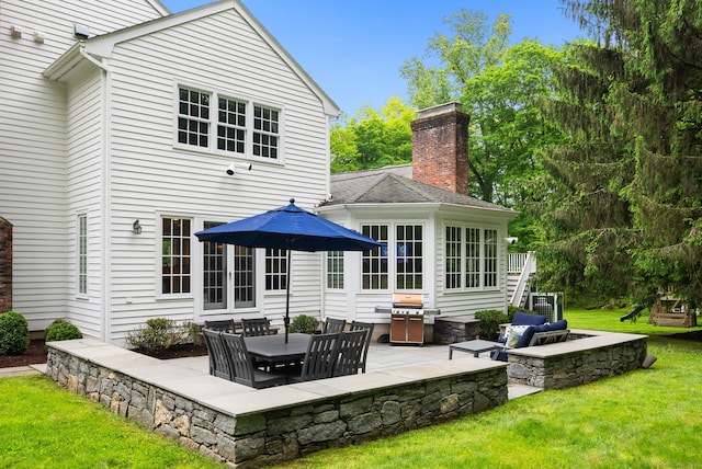 104 Cheesespring Rd, Wilton, CT 06897 - rear view of house with a patio area, a lawn, a chimney, and central AC unit