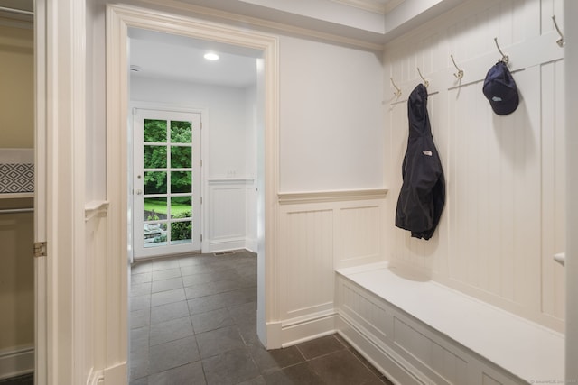 104 Cheesespring Rd, Wilton, CT 06897 - mudroom with a decorative wall, wainscoting, dark tile patterned floors, ornamental molding, and recessed lighting