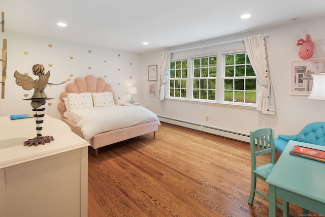 104 Cheesespring Rd, Wilton, CT 06897 - bedroom with a baseboard radiator, wood finished floors, and recessed lighting