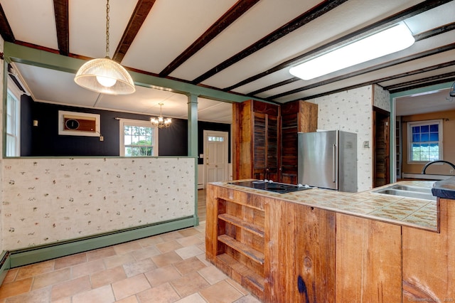 216 Belleview Ave, Southington, CT 06489 - kitchen with freestanding refrigerator, tile counters, a sink, wallpapered walls, and a baseboard heating unit