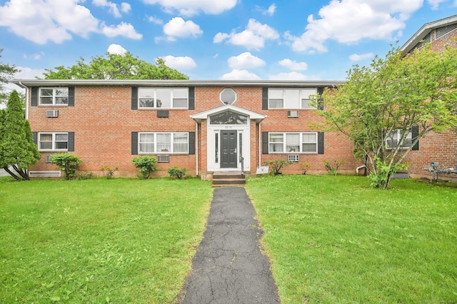 71 Mountain Laurel Dr Unit 71, Wethersfield, CT 06109 - view of front of house featuring brick siding, a front lawn, and cooling unit
