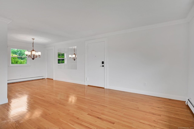 71 Mountain Laurel Dr Unit 71, Wethersfield, CT 06109 - spare room featuring a chandelier, a baseboard radiator, crown molding, light wood-style floors, and baseboards