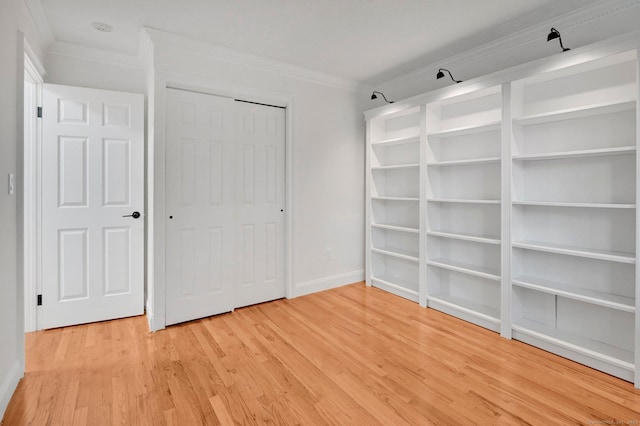 71 Mountain Laurel Dr Unit 71, Wethersfield, CT 06109 - unfurnished bedroom featuring ornamental molding, light wood finished floors, baseboards, and a closet