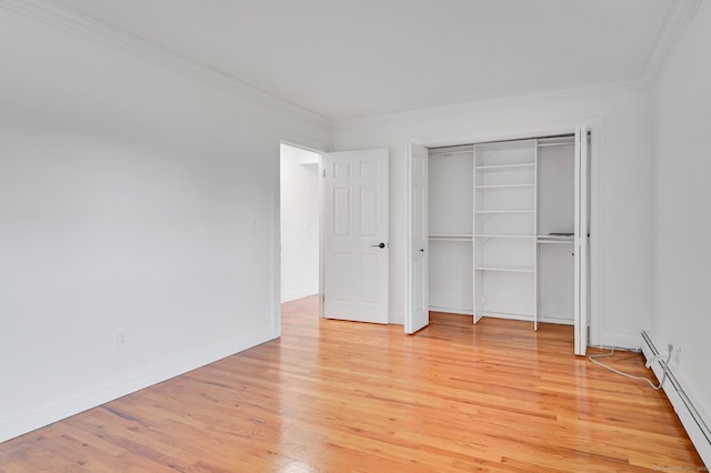 71 Mountain Laurel Dr Unit 71, Wethersfield, CT 06109 - unfurnished bedroom with crown molding, light wood-type flooring, a baseboard radiator, and baseboards