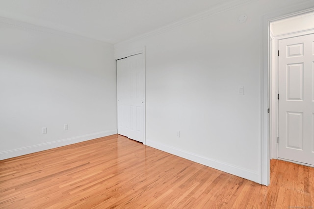 71 Mountain Laurel Dr Unit 71, Wethersfield, CT 06109 - unfurnished room with crown molding, light wood-style floors, baseboards, and a smoke detector