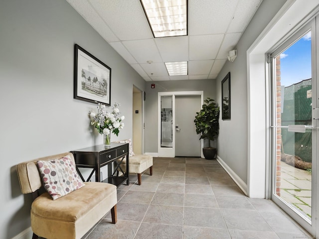19 Isaacs St Apt 307, Norwalk, CT 06850 - hall with a paneled ceiling and baseboards