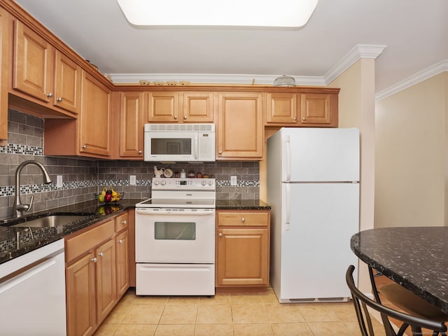 19 Isaacs St Apt 307, Norwalk, CT 06850 - kitchen with white appliances, crown molding, a sink, light tile patterned floors, and decorative backsplash