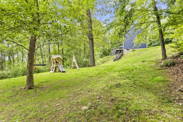 12 Colonial Heights Rd, East Haven, CT 06473 - view of green lawn with stairs and a playground
