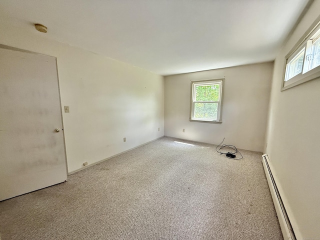 14 Arrowhead Way Apt C1, Woodbury, CT 06798 - unfurnished room featuring a baseboard heating unit, carpet floors, and a smoke detector
