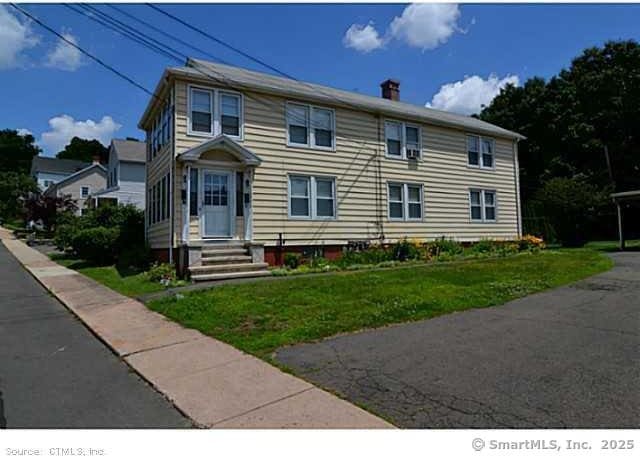 33 Silver St, Branford, CT 06405 - view of front of property with a front yard and a chimney