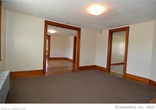 33 Silver St, Branford, CT 06405 - carpeted empty room with baseboards
