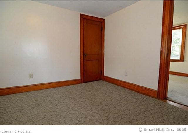 33 Silver St, Branford, CT 06405 - carpeted spare room with baseboards