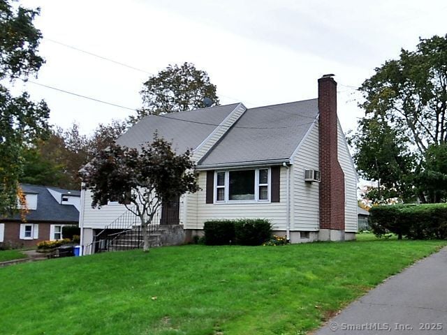 27 Eton Pl, New Britain, CT 06053 - bungalow-style home featuring a chimney and a front yard