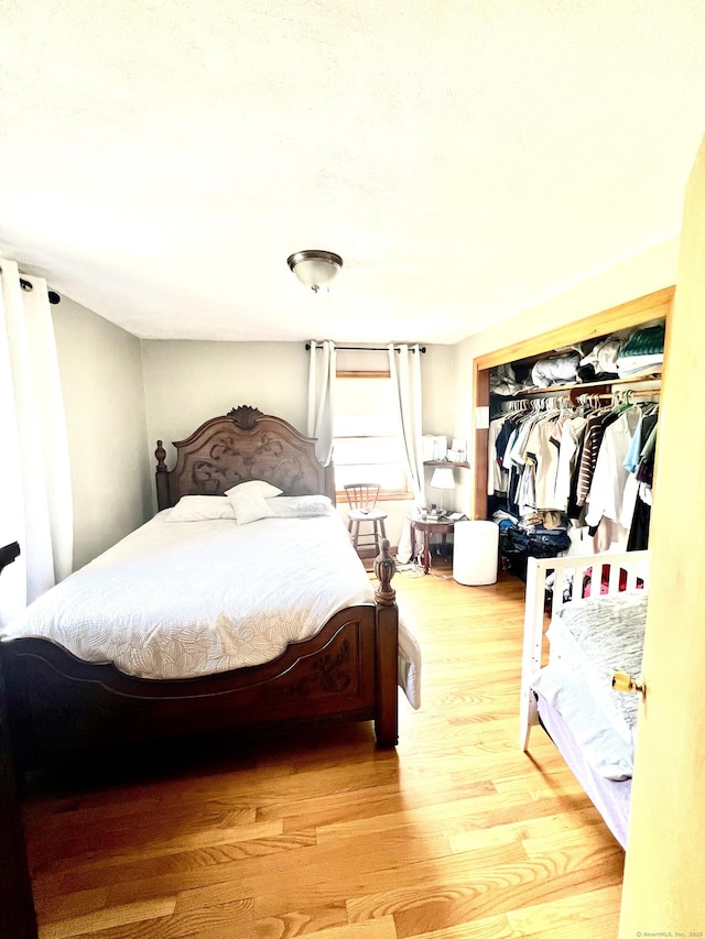 27 Eton Pl, New Britain, CT 06053 - bedroom featuring wood finished floors and a closet