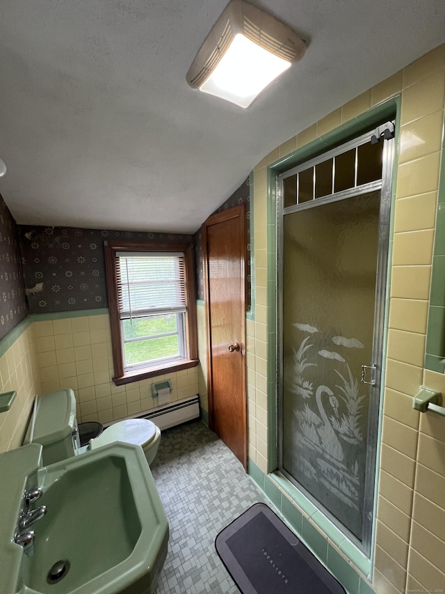27 Eton Pl, New Britain, CT 06053 - bathroom featuring a sink, toilet, wallpapered walls, a stall shower, and tile walls
