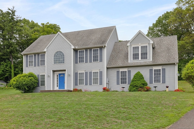 63 Old Cider Mill Rd, Southington, CT 06489 - colonial house featuring a front yard and roof with shingles
