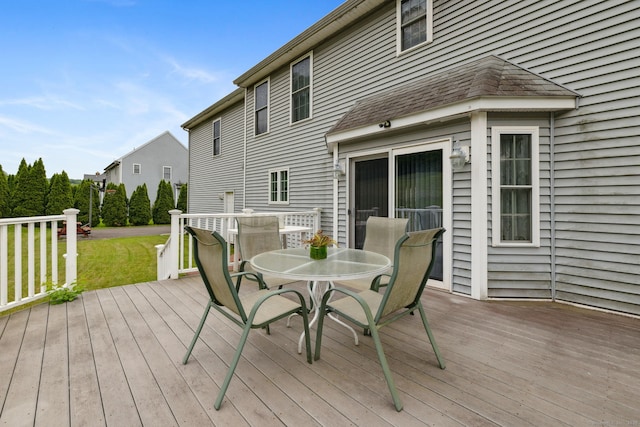 63 Old Cider Mill Rd, Southington, CT 06489 - wooden deck featuring outdoor dining space and a lawn