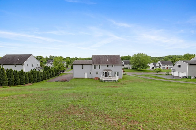 63 Old Cider Mill Rd, Southington, CT 06489 - back of property with a residential view and a yard