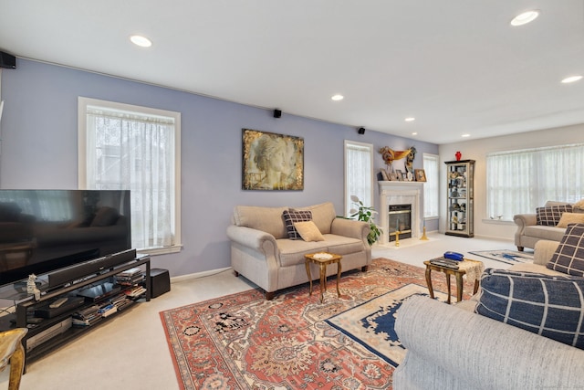 63 Old Cider Mill Rd, Southington, CT 06489 - carpeted living room with recessed lighting, a tiled fireplace, and baseboards