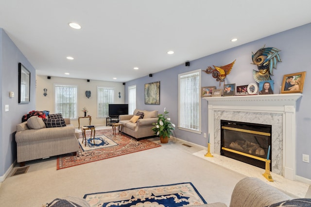 63 Old Cider Mill Rd, Southington, CT 06489 - living area featuring recessed lighting, baseboards, a high end fireplace, and carpet flooring