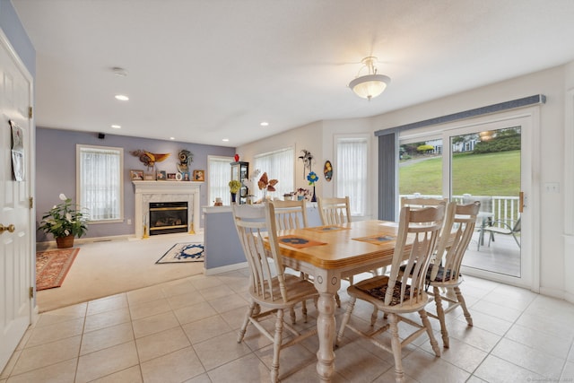63 Old Cider Mill Rd, Southington, CT 06489 - dining room featuring healthy amount of natural light, light carpet, light tile patterned flooring, a fireplace, and recessed lighting