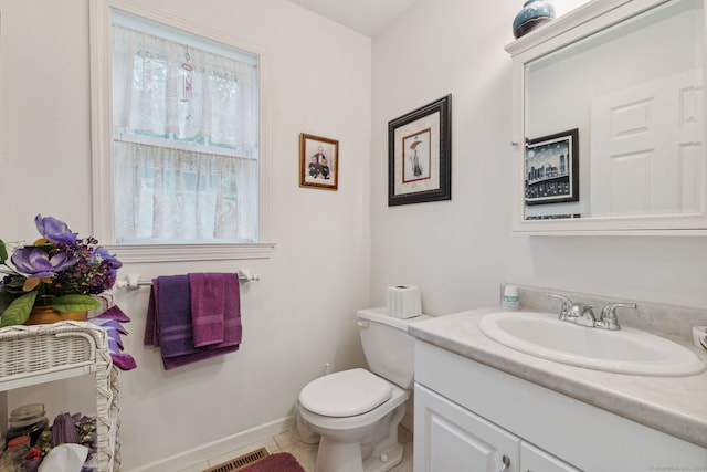 63 Old Cider Mill Rd, Southington, CT 06489 - bathroom featuring vanity, toilet, tile patterned flooring, and baseboards