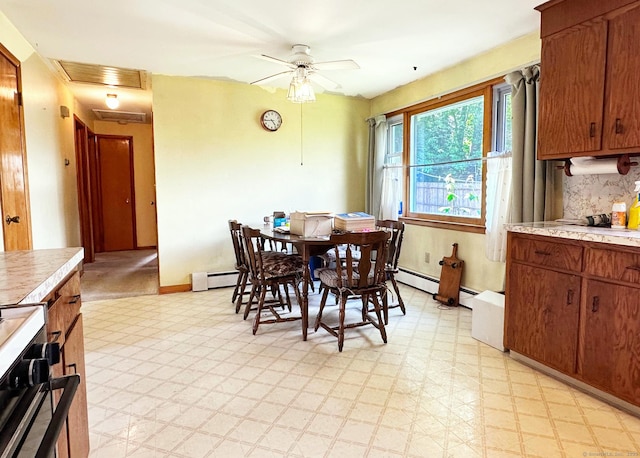 100 Arcadia Ave, Stratford, CT 06614 - dining space with light flooring, attic access, baseboard heating, and ceiling fan