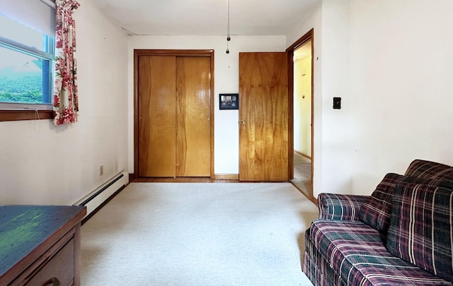 100 Arcadia Ave, Stratford, CT 06614 - living area featuring carpet flooring and a baseboard radiator