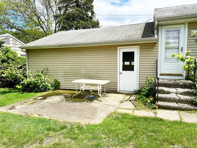 100 Arcadia Ave, Stratford, CT 06614 - rear view of house with a patio and a shingled roof