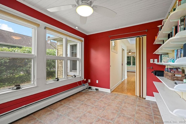 33 Bellevue Pl, Middletown, CT 06457 - spare room featuring a baseboard heating unit, ceiling fan, light tile patterned floors, and baseboards