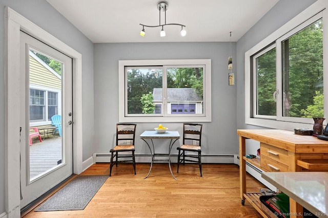 33 Bellevue Pl, Middletown, CT 06457 - dining room with light wood finished floors and a baseboard radiator