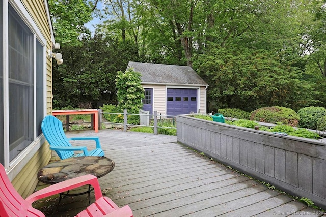 33 Bellevue Pl, Middletown, CT 06457 - wooden terrace with an outdoor structure and a detached garage