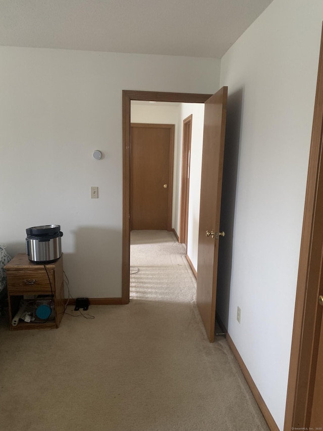 58 Amanda Cir, Windsor, CT 06095 - corridor featuring light colored carpet and baseboards