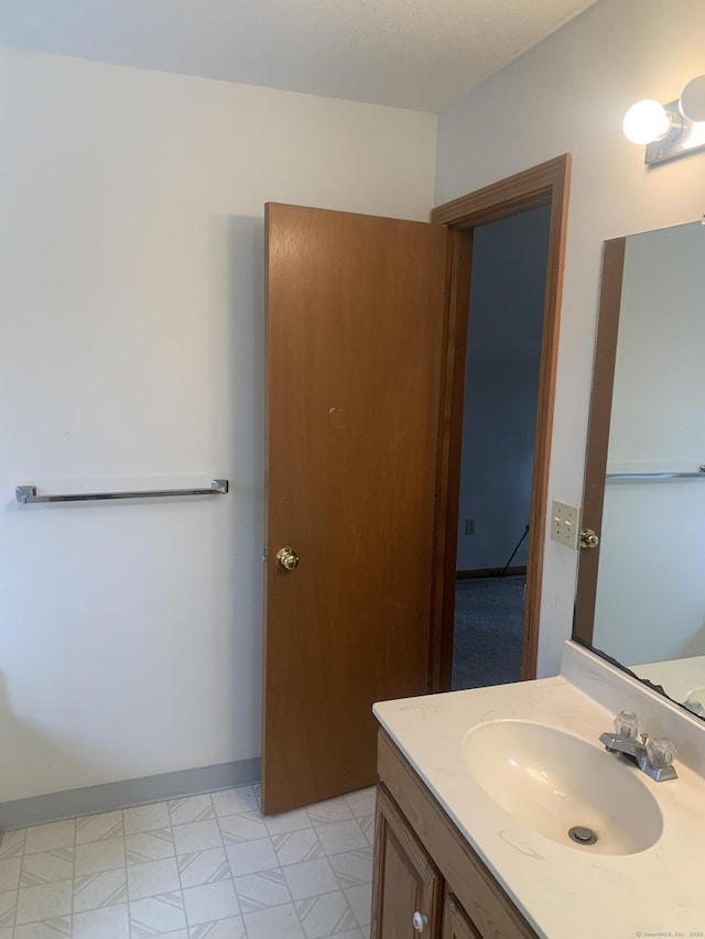 58 Amanda Cir, Windsor, CT 06095 - bathroom with vanity and baseboards